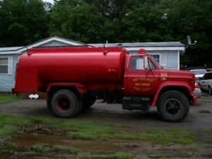 Our new water truck. No siren, but the flashing lights work!